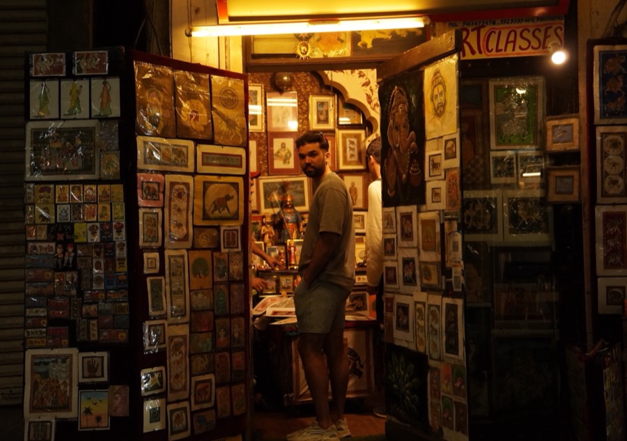 A tourist at a miniature art store
